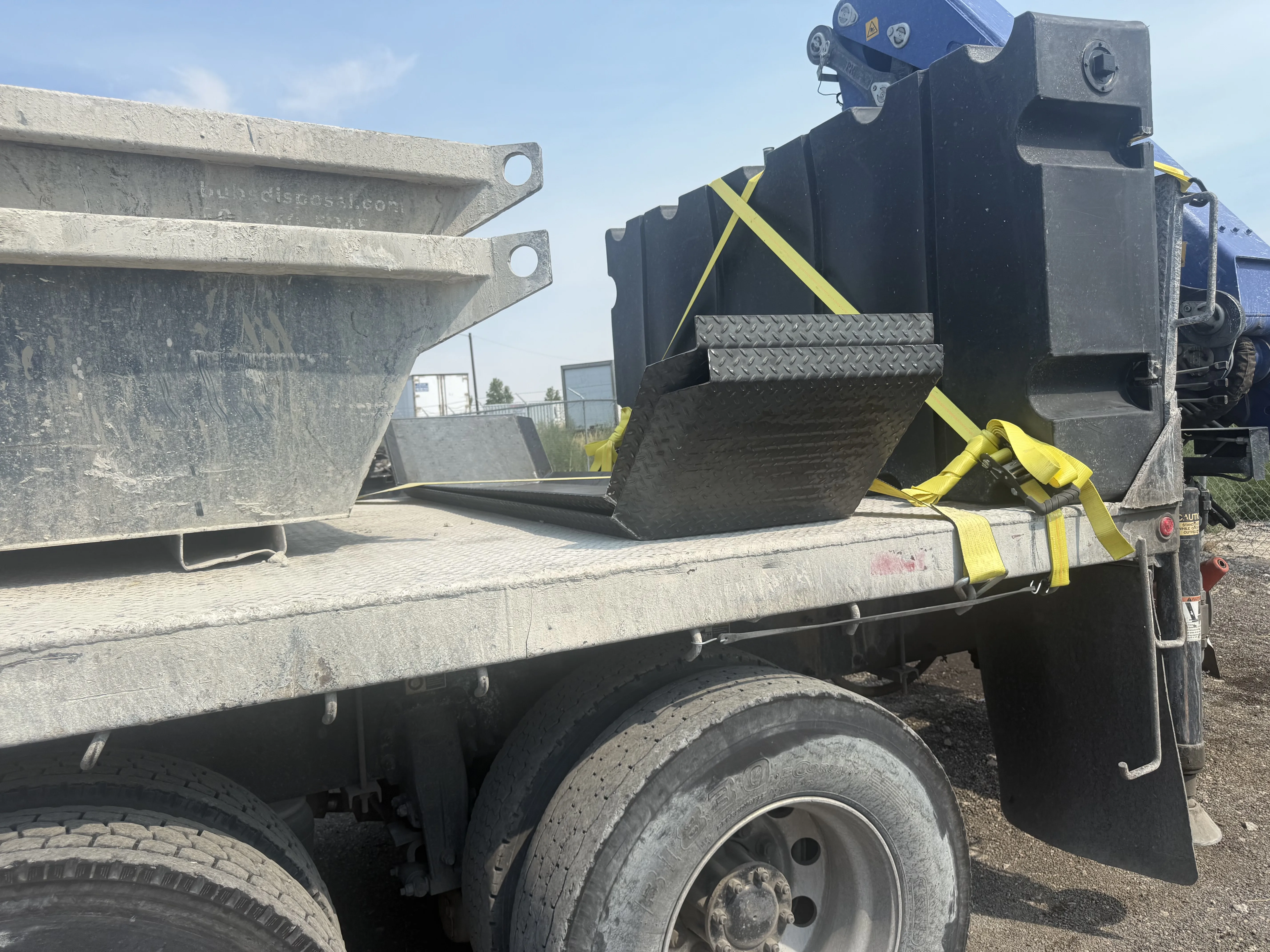 2.5 yard concrete washout pans on flatbed for delivery